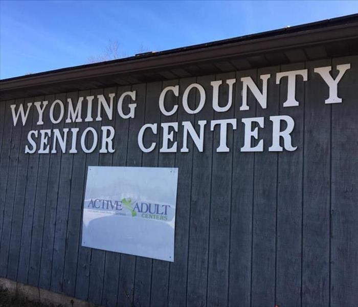 Brown building with "Wyoming County Senior Center" text on it